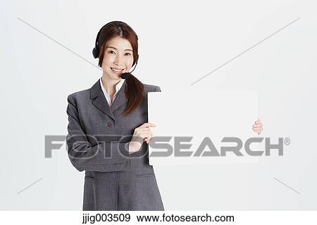 Attractive Japanese office worker View Large Photo Image Stock Photo - Attractive Japanese office worker. Fotosearch