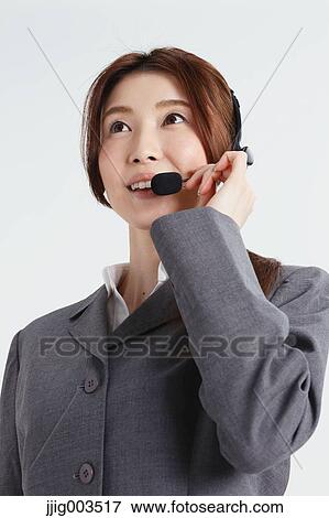 Attractive Japanese office worker View Large Photo Image Stock Photo - Attractive Japanese office worker. Fotosearch