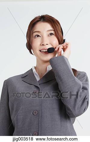 Attractive Japanese office worker View Large Photo Image Stock Photo - Attractive Japanese office worker. Fotosearch