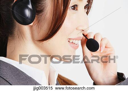 Stock Photography - Attractive Japanese office worker. Fotosearch