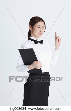 Attractive Japanese sommelier View Large Photo Image Picture - Attractive Japanese sommelier. Fotosearch