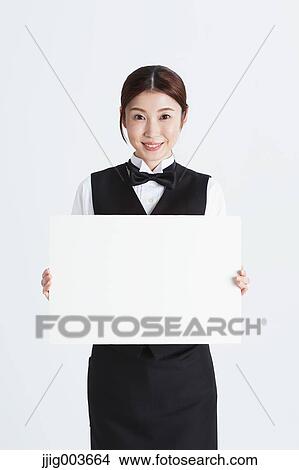 Attractive Japanese sommelier View Large Photo Image Picture - Attractive Japanese sommelier. Fotosearch