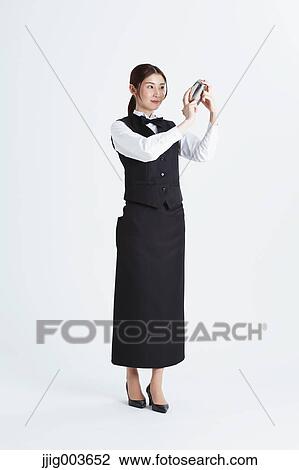 Stock Image - Attractive Japanese sommelier. Fotosearch