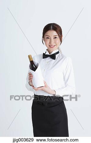 Attractive Japanese sommelier View Large Photo Image Stock Photo - Attractive Japanese sommelier. Fotosearch