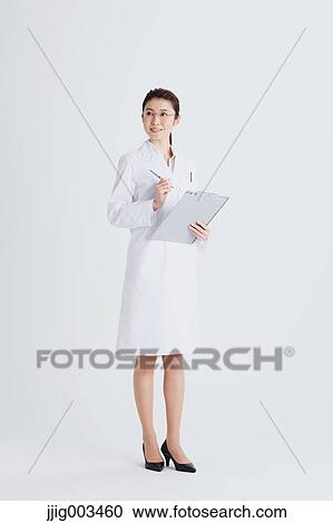 Stock Image - Attractive Japanese woman doctor. Fotosearch