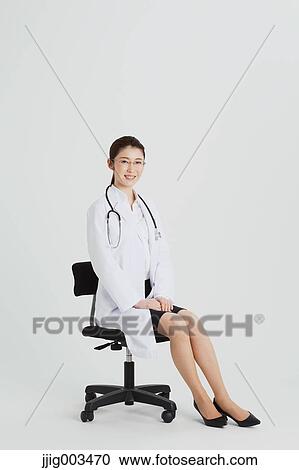 Stock Image - Attractive Japanese woman doctor. Fotosearch