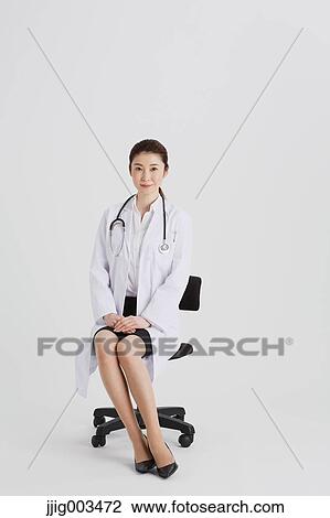 Stock Image - Attractive Japanese woman doctor. Fotosearch