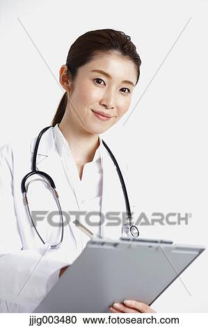 Stock Image - Attractive Japanese woman doctor. Fotosearch