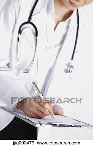 Attractive Japanese woman doctor View Large Photo Image Stock Photo - Attractive Japanese woman doctor. Fotosearch