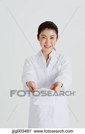 Stock Photo - Attractive Japanese woman doctor. Fotosearch