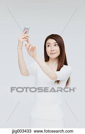 Attractive Japanese woman View Large Photo Image Stock Image - Attractive Japanese woman. Fotosearch