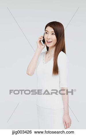 Attractive Japanese woman View Large Photo Image Stock Photograph - Attractive Japanese woman. Fotosearch