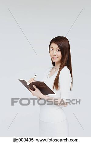 Attractive Japanese woman View Large Photo Image Stock Photography - Attractive Japanese woman. Fotosearch