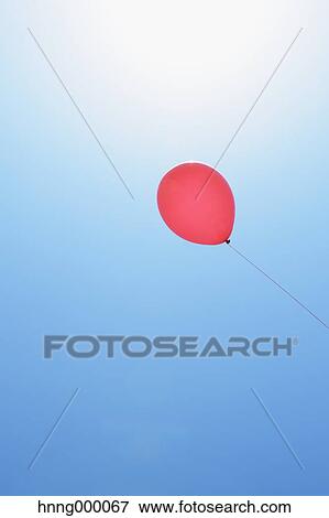Balloon in the sky View Large Photo Image Stock Photo - Balloon in the sky. Fotosearch