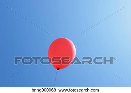 Balloon in the sky View Large Photo Image Stock Photo - Balloon in the sky. Fotosearch