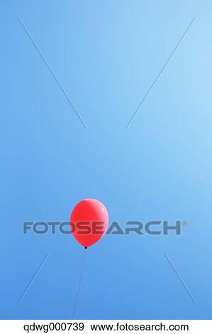 Stock Photo - Balloon in the sky. Fotosearch