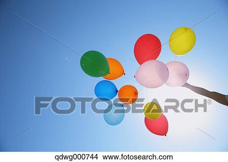 Balloons in the sky View Large Photo Image Picture - Balloons in the sky. Fotosearch