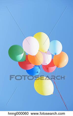 Balloons in the sky View Large Photo Image Stock Image - Balloons in the sky. Fotosearch