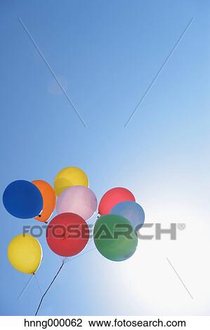 Balloons in the sky View Large Photo Image Stock Image - Balloons in the sky. Fotosearch