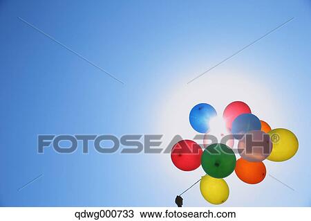 Balloons in the sky View Large Photo Image Stock Image - Balloons in the sky. Fotosearch
