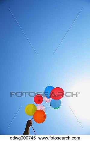 Balloons in the sky View Large Photo Image Stock Photography - Balloons in the sky. Fotosearch