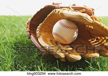 Baseball equipment on grass View Large Photo Image Picture - Baseball equipment on grass. Fotosearch