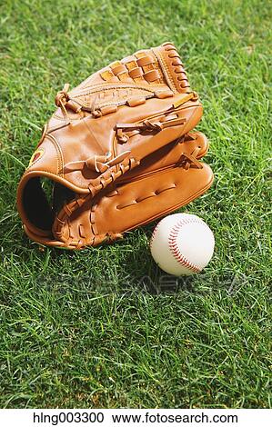 Baseball equipment on grass View Large Photo Image Stock Image - Baseball equipment on grass. Fotosearch