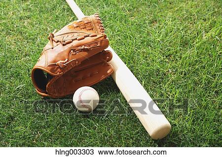Baseball equipment on grass View Large Photo Image Stock Image - Baseball equipment on grass. Fotosearch