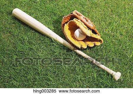 Baseball equipment on grass View Large Photo Image Stock Photography - Baseball equipment on grass. Fotosearch