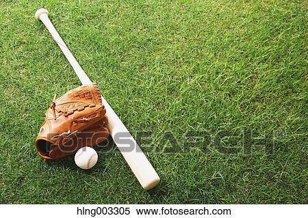 Baseball equipment on grass View Large Photo Image Stock Photography - Baseball equipment on grass. Fotosearch