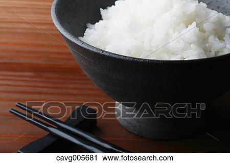 Stock Image - Bowl of white rice. Fotosearch