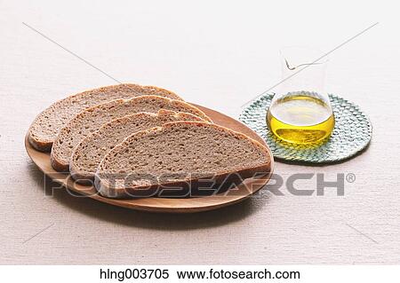 Stock Photography - Bread and olive oil. Fotosearch