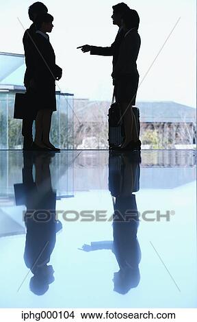 Picture - Business people at the airport. Fotosearch