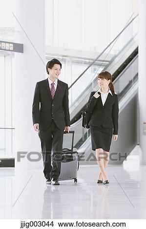 Picture - Business people at the airport. Fotosearch