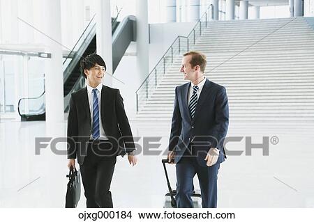 Business people at the airport View Large Photo Image Picture - Business people at the airport. Fotosearch