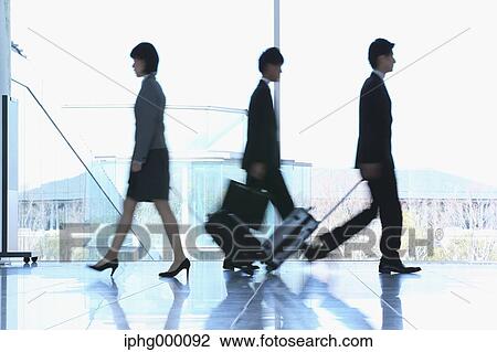 Business people at the airport View Large Photo Image Stock Image - Business people at the airport. Fotosearch