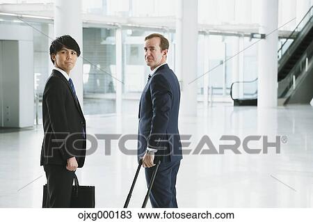 Business people at the airport View Large Photo Image Stock Image - Business people at the airport. Fotosearch