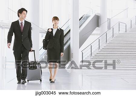 Stock Photography - Business people at the airport. Fotosearch