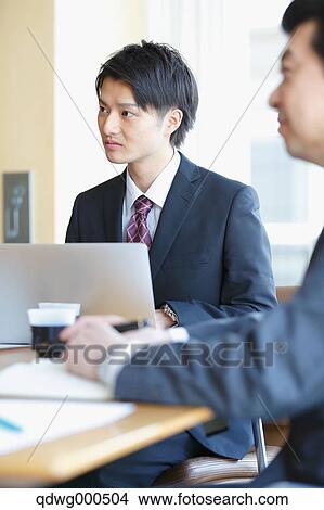 Business people having a meeting View Large Photo Image Picture - Business people having a meeting. Fotosearch