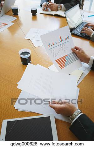 Business people having a meeting View Large Photo Image Stock Photograph - Business people having a meeting. Fotosearch
