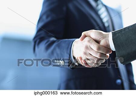 Business people shaking hands View Large Photo Image Stock Image - Business people shaking hands. Fotosearch