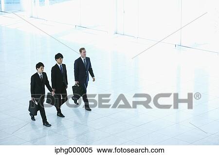 Stock Photography - Businessmen at the airport. Fotosearch