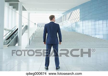 Caucasian businessman in modern office View Large Photo Image Picture - Caucasian businessman in modern office. Fotosearch