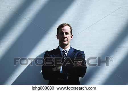 Stock Image - Caucasian businessman in modern office. Fotosearch