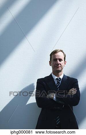 Caucasian businessman in modern office View Large Photo Image Stock Image - Caucasian businessman in modern office. Fotosearch