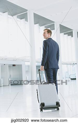 Caucasian businessman in modern office View Large Photo Image Stock Image - Caucasian businessman in modern office. Fotosearch