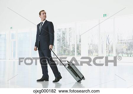 Caucasian businessman in modern office View Large Photo Image Stock Image - Caucasian businessman in modern office. Fotosearch