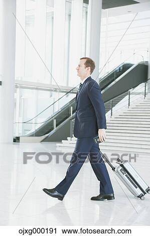 Stock Image - Caucasian businessman in modern office. Fotosearch