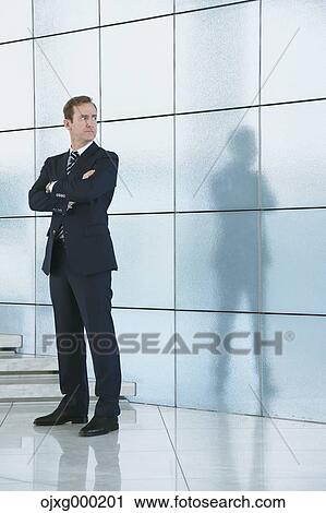 Caucasian businessman in modern office View Large Photo Image Stock Image - Caucasian businessman in modern office. Fotosearch