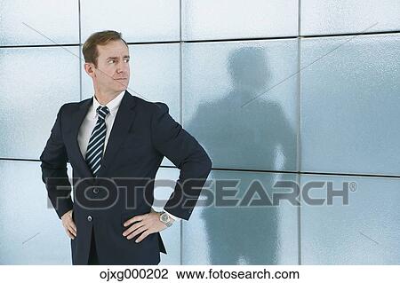 Caucasian businessman in modern office View Large Photo Image Stock Image - Caucasian businessman in modern office. Fotosearch